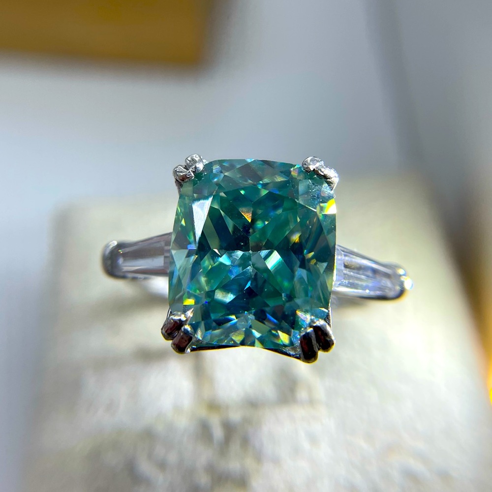 Beautiful 5.06ct Bluish green elongated cushion cut moissanite. stone only